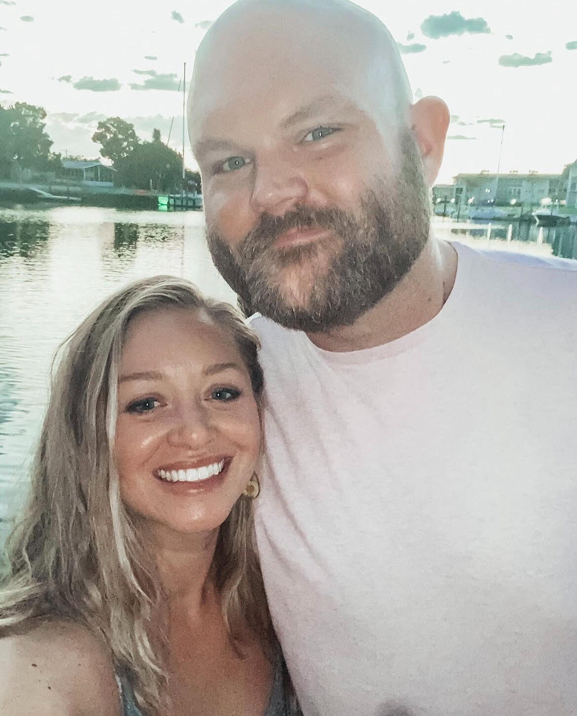 Chuck and Melissa, the owners of TurtleTotes, on the water in New Port Richey